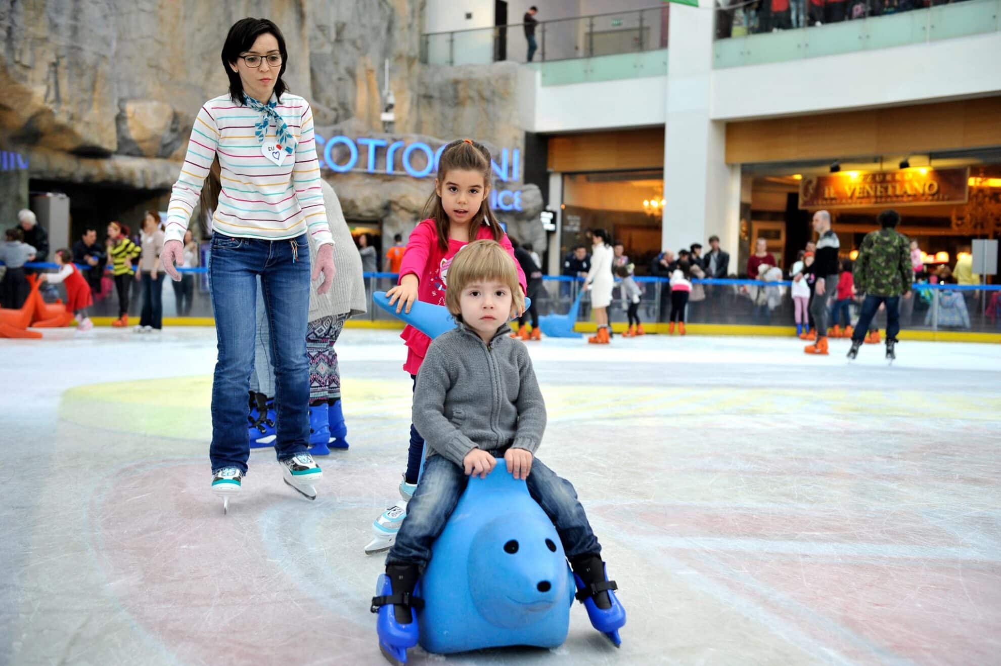 kids ice skating on blue bobby the seal