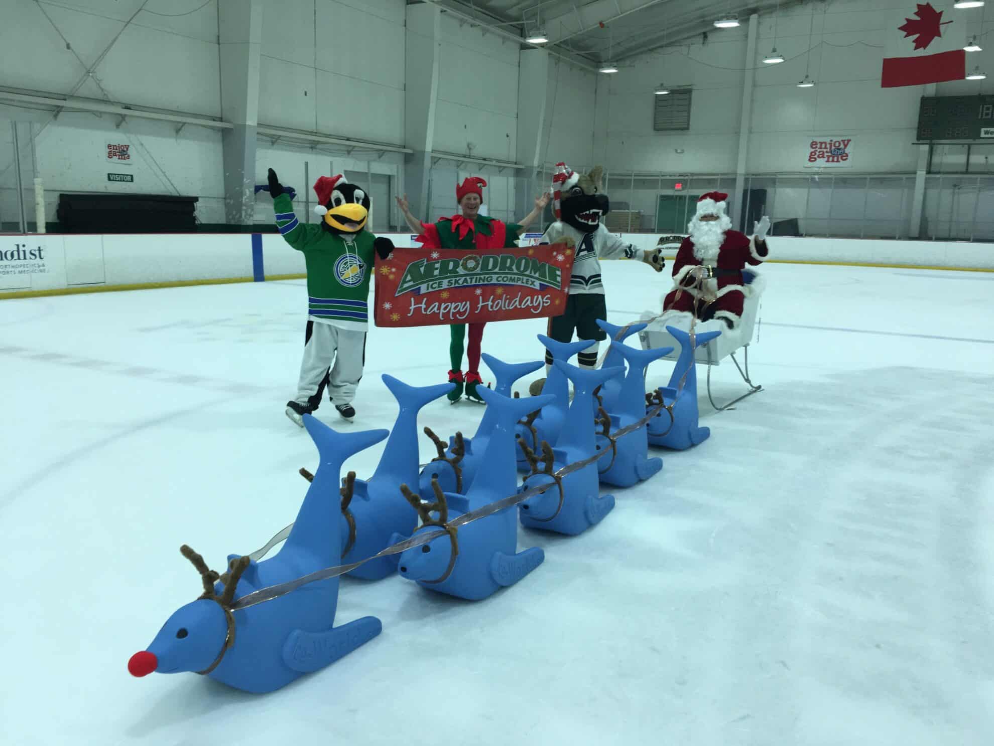 Bobby the seal ice skating aids with santa claus